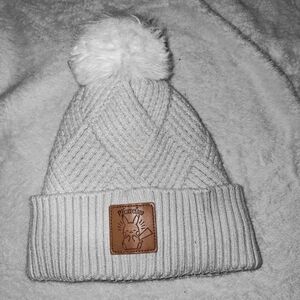 Pikachu White knit beanie with a pom-pom. Officially licensed Pokémon